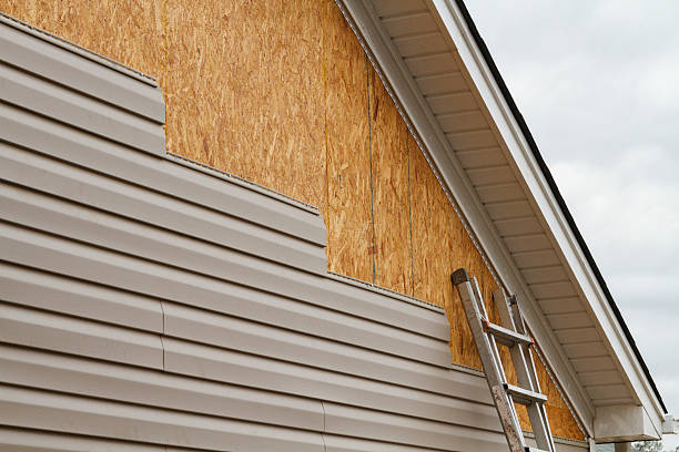 Professional Emergency Siding Repair technician working in Woodbury, NY